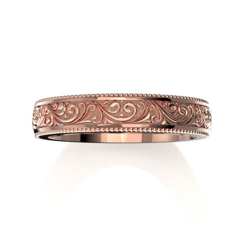 Classic men's rose gold wedding ring with detailed scroll design and engraved borders