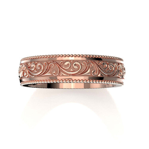 Classic men's rose gold wedding ring with detailed scroll design and engraved borders