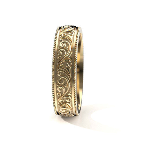 Handcrafted men's yellow gold wedding band featuring detailed scrollwork and vintage-inspired design