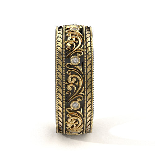 Handcrafted men's yellow gold wedding band featuring intricate scrollwork, engraved borders, and natural diamonds