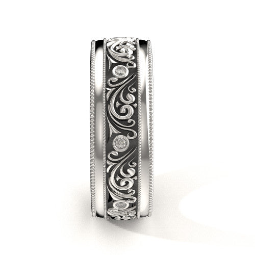 Handcrafted men's white gold wedding band featuring detailed scrollwork, double milgrain edges, and diamond accents