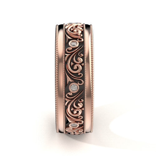 Handcrafted men's rose gold wedding band featuring detailed scrollwork, double milgrain edges, and diamond accents