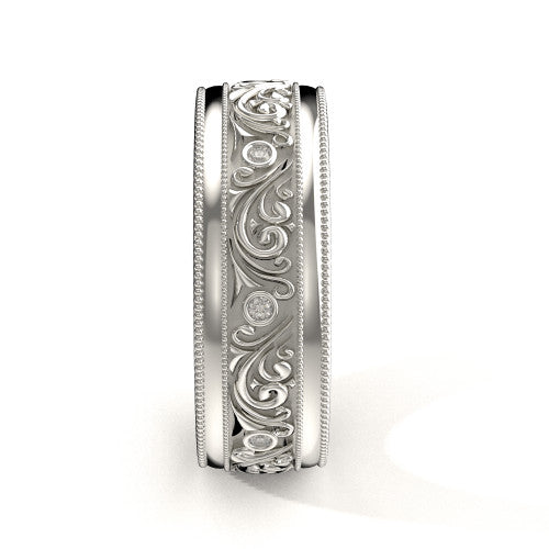 Handcrafted men's white gold wedding band featuring detailed scrollwork, double milgrain edges, and diamond accents