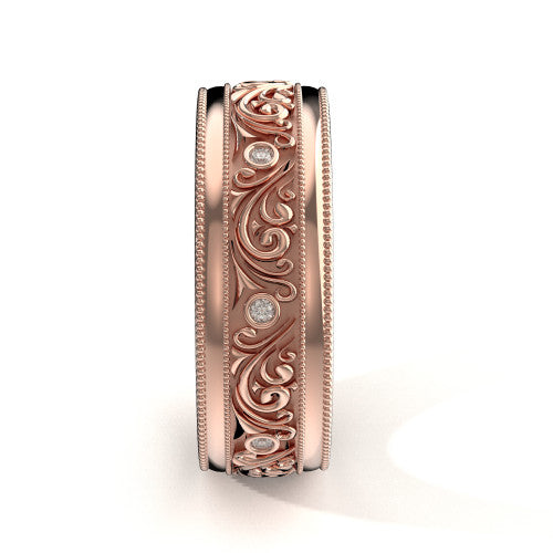 Handcrafted men's rose gold wedding band featuring detailed scrollwork, double milgrain edges, and diamond accents